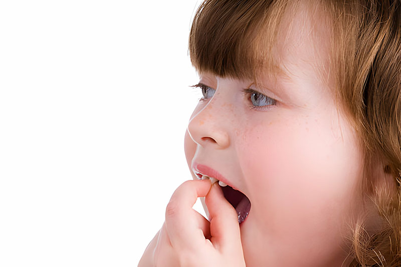 علت لق شدن دندان شیری کودکان